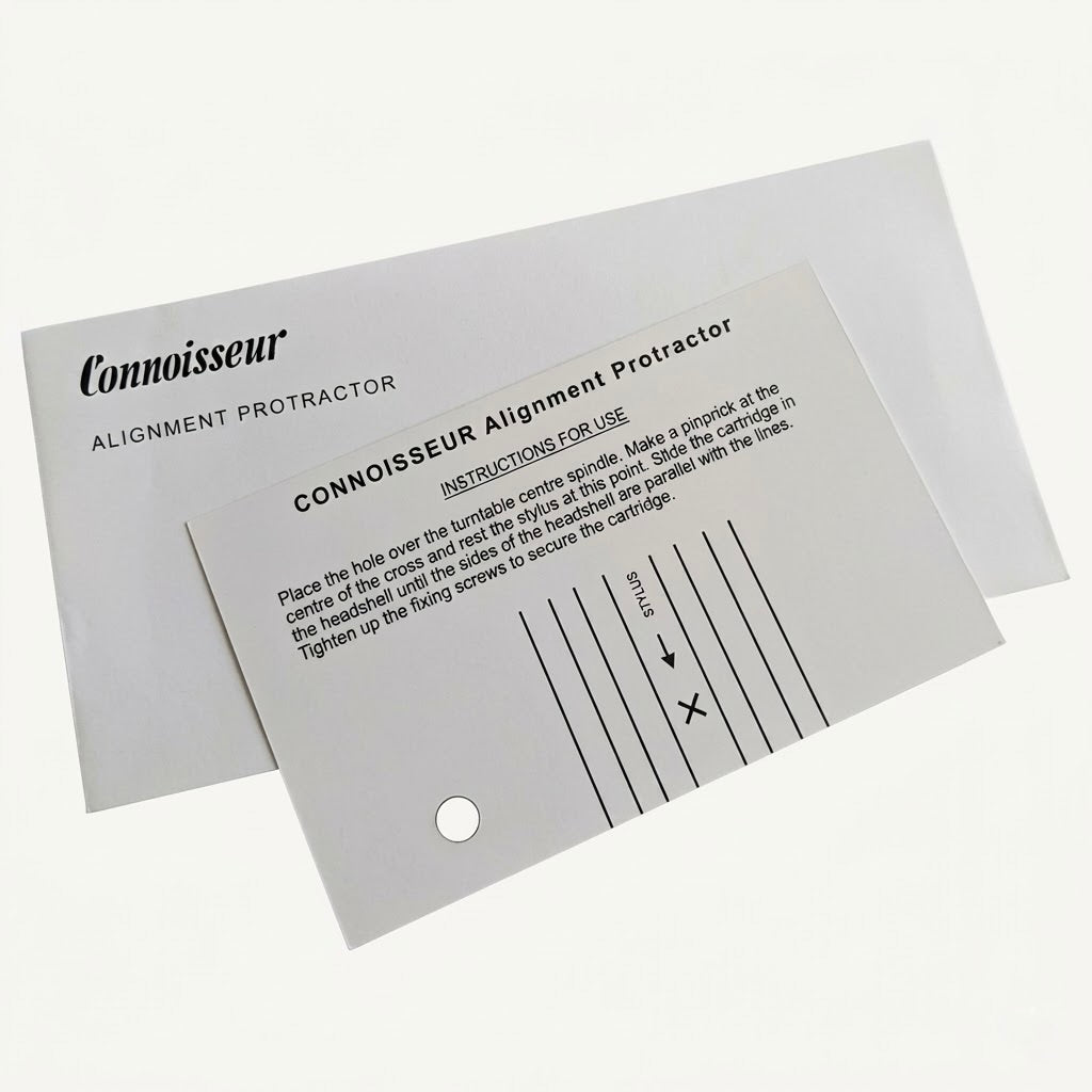 A crisp, high-resolution product photograph of two white paper components for a vintage Connoisseur Alignment Protractor, isolated against a seamless off-white background. The background card features the classic stylised 'Connoisseur' logo with the words 'ALIGNMENT PROTRACTOR' below it. Layered neatly over it at a slight angle is the smaller instructional card, which contains printed instructions under the heading 'CONNOISSEUR Alignment Protractor INSTRUCTIONS FOR USE', alongside alignment parallel grid.