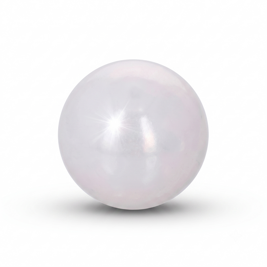 A close-up product shot of a single, perfectly spherical white ceramic ball bearing, centered against a seamless white background. The ball features a smooth, glossy surface with a bright white starburst light flare reflecting off the upper left side, and a soft, realistic drop shadow underneath it.