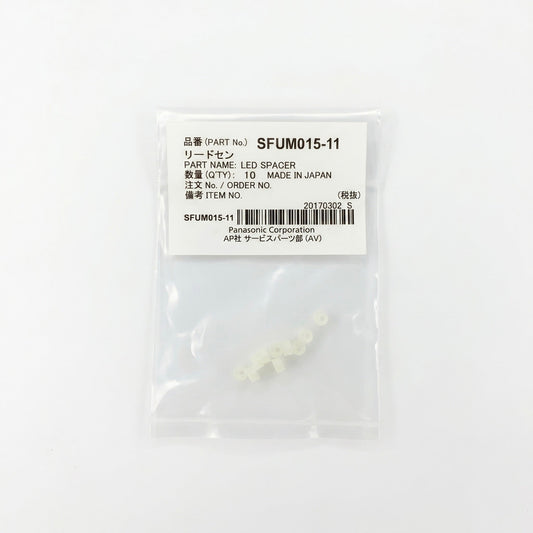 A small, clear plastic bag containing 10 tiny, translucent off-white LED spacers. The top of the bag features a white label with black text displaying 'PART No. SFUM015-11', 'PART NAME: LED SPACER', 'QTY: 10', and 'Panasonic Corporation', alongside a barcode. The package is centered against a clean, solid white background.