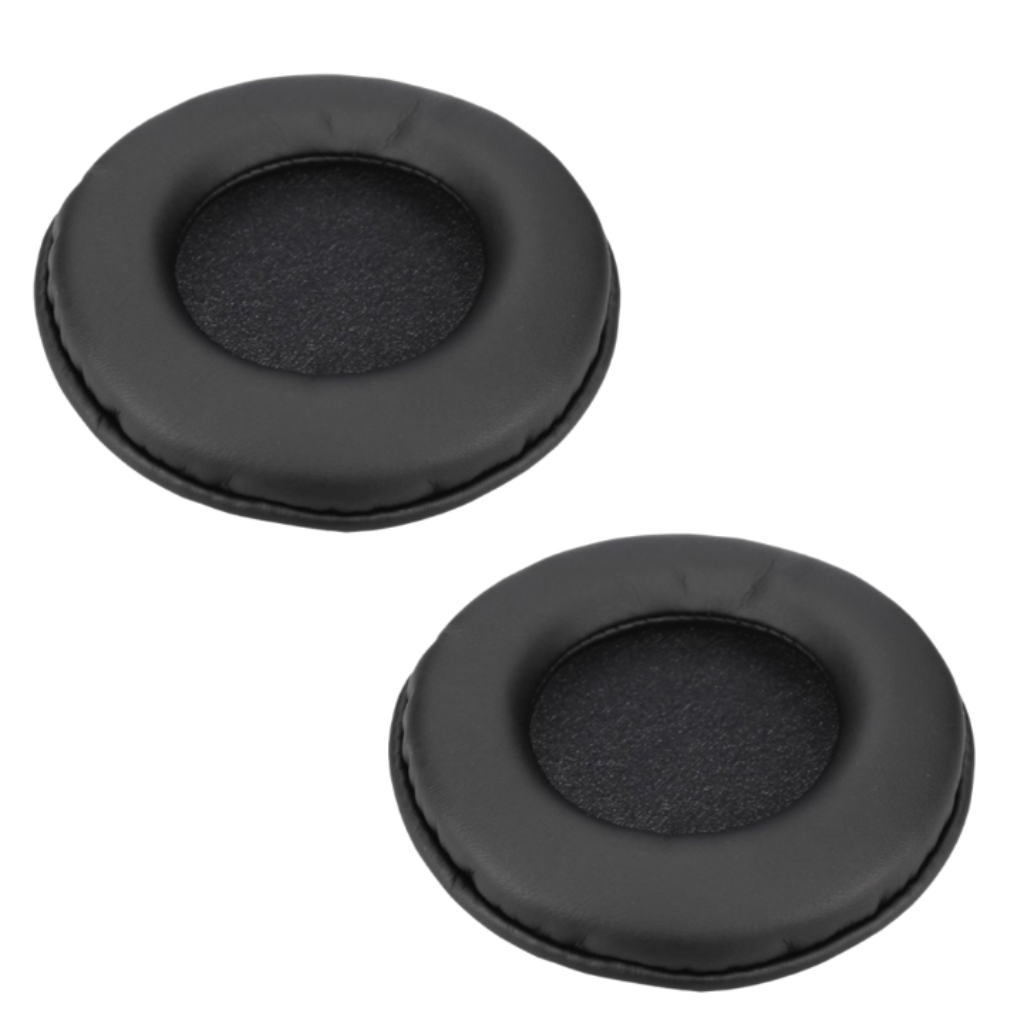 Two identical, circular black leatherette ear pads for headphones, shown from an angled top-down perspective against a plain white background. The pads feature a cushioned outer ring with subtle stitching and a porous black fabric mesh in the center.