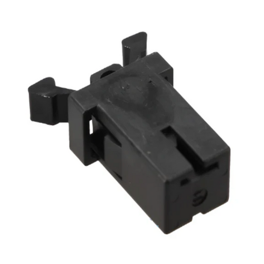 Black plastic component on a white background
