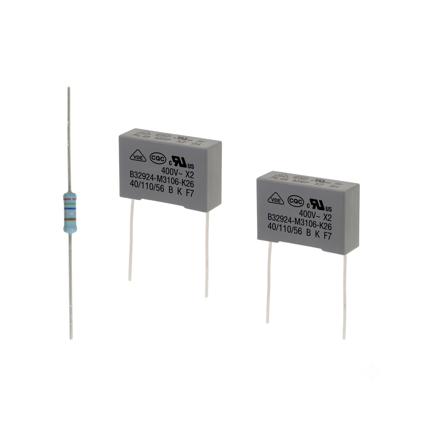 Bernina sewing machine board repair kit featuring two grey safety film capacitors (B32924-M3106-K26) and one axial resistor.