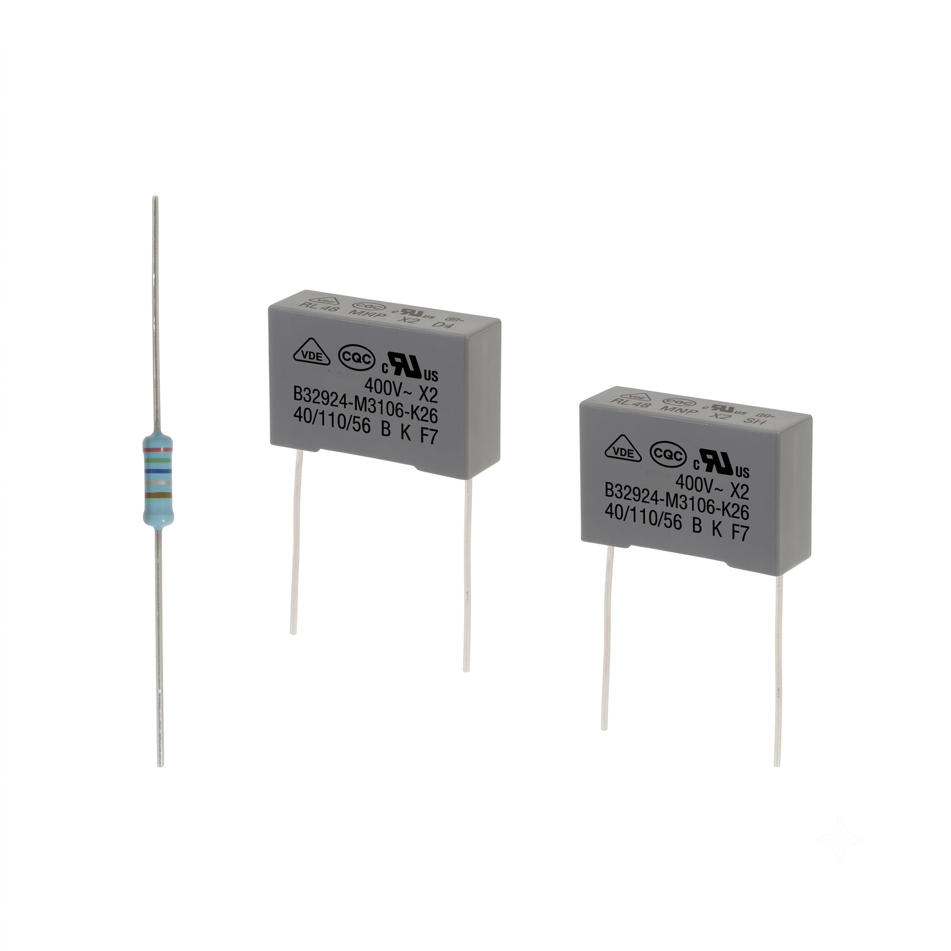 Bernina sewing machine board repair kit featuring two grey safety film capacitors (B32924-M3106-K26) and one axial resistor.