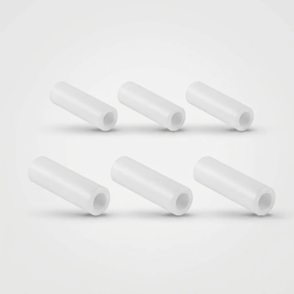Six white silicone rubber spring sleeves for Garrard 301 and 401 turntable motors, arranged in two rows on a plain gray background.