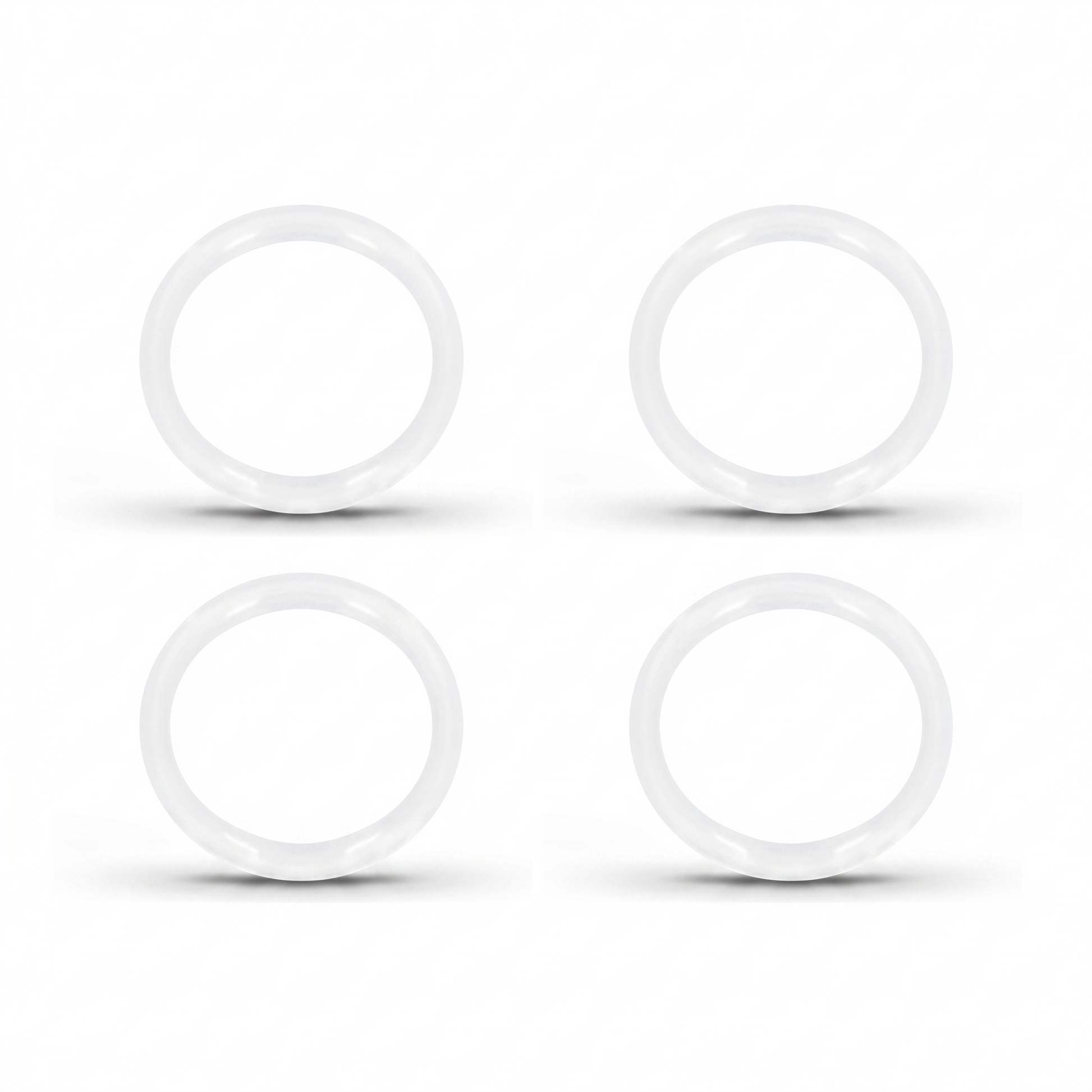 A product image showing a 4-pack of replacement translucent white silicone sealing rings for Grunwerg Drinkpod flasks. The four round rubber gaskets are arranged symmetrically in a two-by-two grid against a clean white background, each casting a soft shadow beneath it.