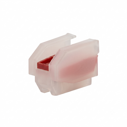 A studio product shot of a semi-transparent, white plastic turntable cartridge body without the needle assembly, shown at an angle against a solid white background.