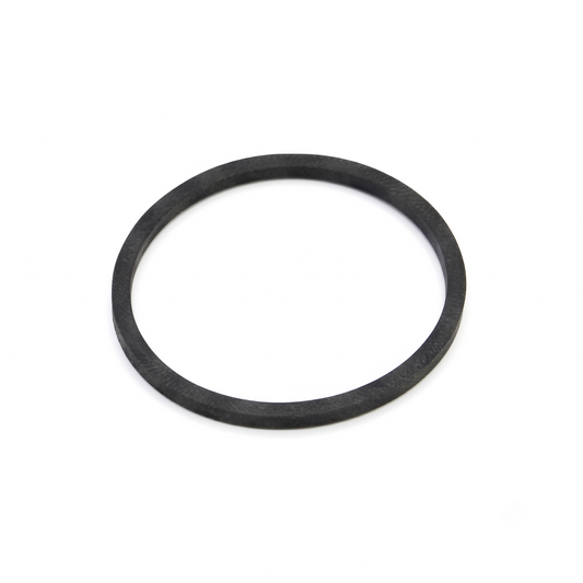 A black rubber square-cut drive belt, forming a clean circle, resting flat on a seamless white surface with soft shadowing underneath.