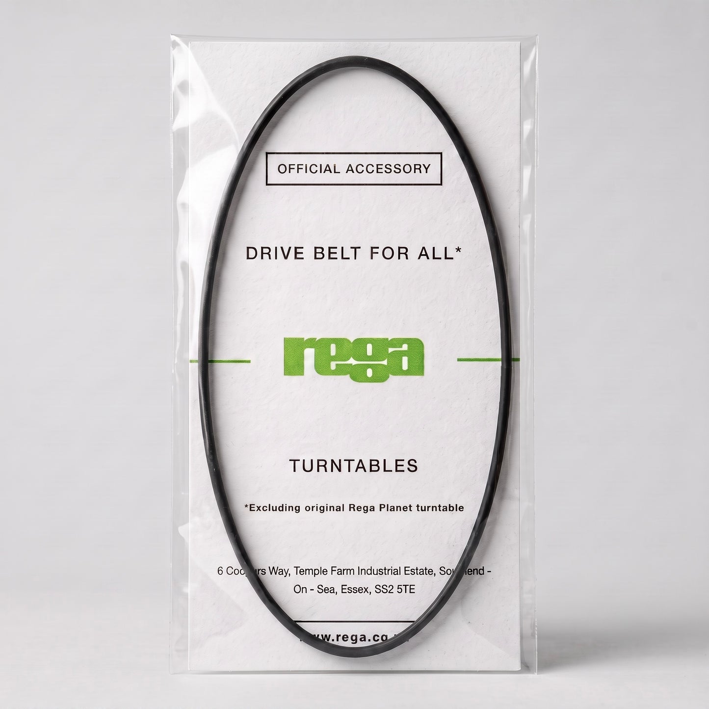 An official Rega turntable drive belt displayed inside its clear, protective plastic layflat packaging. The black, oval-shaped rubber belt is mounted on a textured white backing card featuring the bright green Rega logo. Text on the packaging reads "OFFICIAL ACCESSORY," "DRIVE BELT FOR ALL* TURNTABLES," with a footnote at the bottom that reads "*Excluding original Rega Planet turntable." The clean, high-definition studio shot is set against a minimalist light grey background.