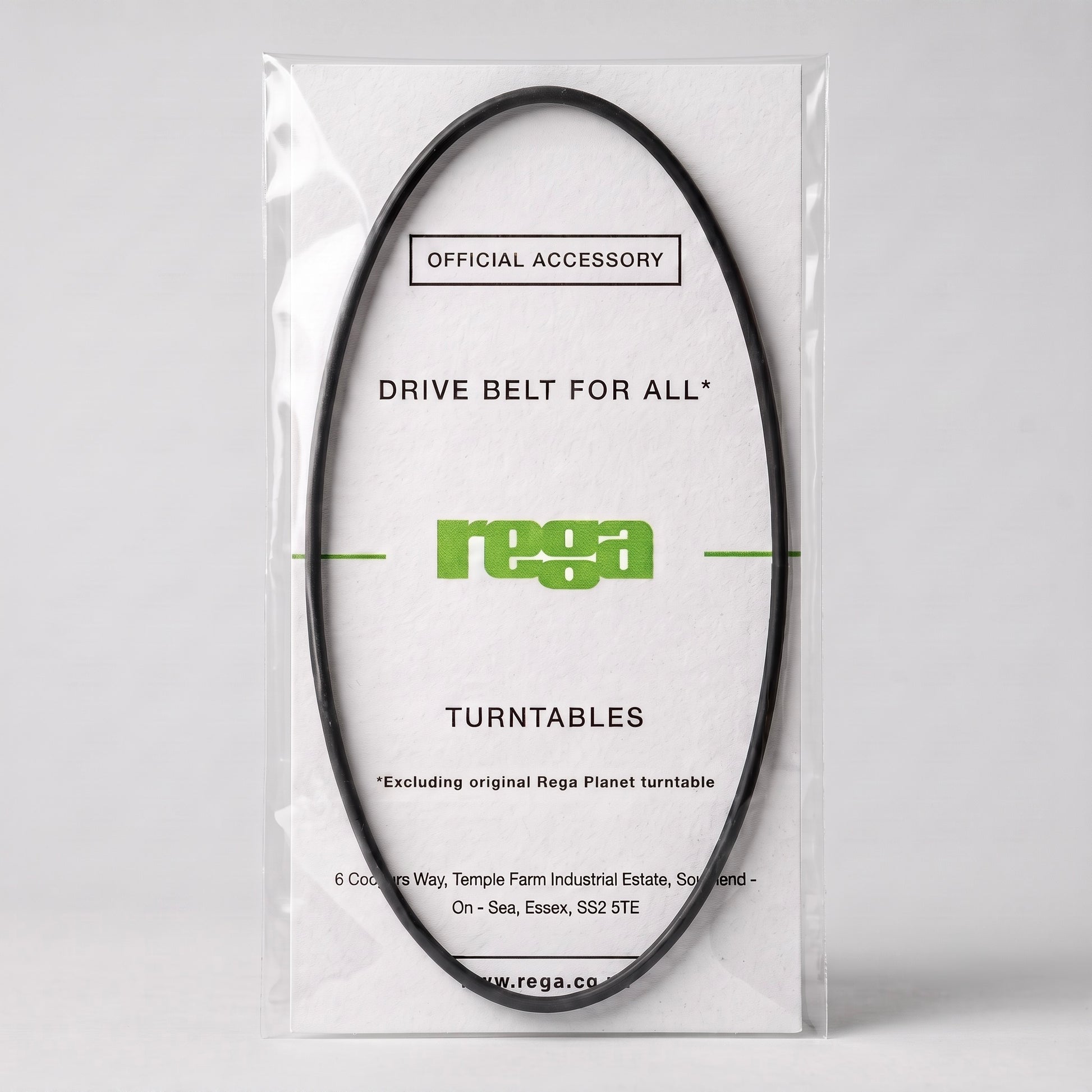 An official Rega turntable drive belt displayed inside its clear, protective plastic layflat packaging. The black, oval-shaped rubber belt is mounted on a textured white backing card featuring the bright green Rega logo. Text on the packaging reads "OFFICIAL ACCESSORY," "DRIVE BELT FOR ALL* TURNTABLES," with a footnote at the bottom that reads "*Excluding original Rega Planet turntable." The clean, high-definition studio shot is set against a minimalist light grey background.