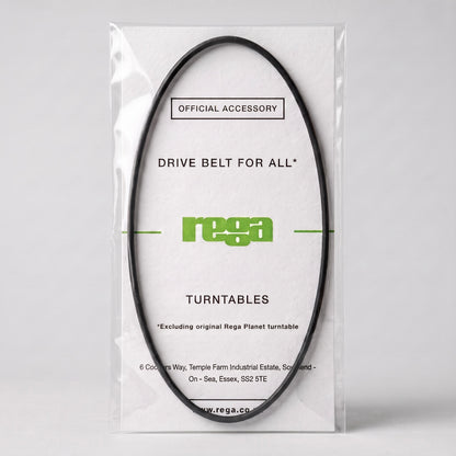 An official Rega turntable drive belt displayed inside its clear, protective plastic layflat packaging. The black, oval-shaped rubber belt is mounted on a textured white backing card featuring the bright green Rega logo. Text on the packaging reads "OFFICIAL ACCESSORY," "DRIVE BELT FOR ALL* TURNTABLES," with a footnote at the bottom that reads "*Excluding original Rega Planet turntable." The clean, high-definition studio shot is set against a minimalist light grey background.
