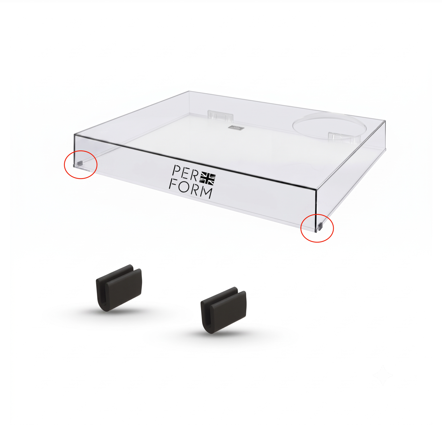 A clear acrylic display tray with the brand name 'PERFORM' printed on the side, shown above two small black accessory pieces on a white background. Red circles highlight the bottom corners of the tray.