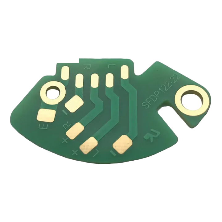 
An overhead, close-up studio shot of a small, green, semi-circular printed circuit board (PCB) labelled "SFDP122-22" against a solid white background. The PCB features gold-plated contact pads and traces arranged in a fan-like pattern. Several pads are marked with white silk-screened characters, including "L," "R," "+," and "-," indicating left and right audio channels and polarity. Two large gold-lined mounting holes are positioned on opposite sides of the board.