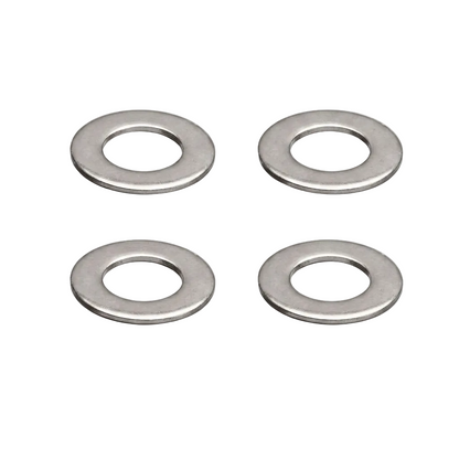 Four metallic washers on a white background