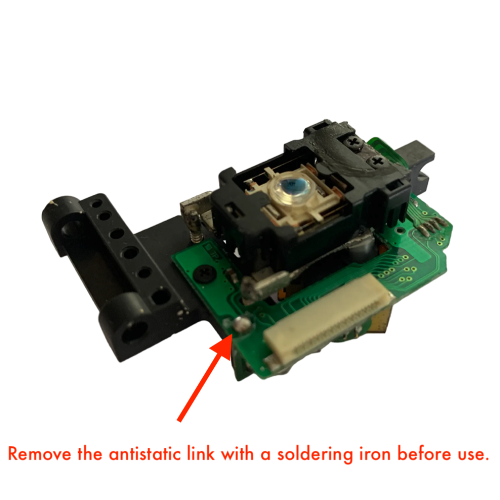 Electronic component with a green circuit board and black housing on a white background, with text indicating the need to remove an antistatic link before use.