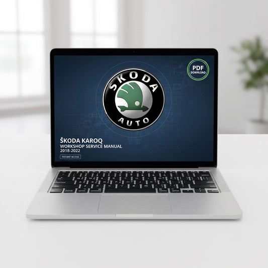A silver laptop on a white desk displaying a ŠKODA AUTO workshop service manual PDF cover, with a blurred indoor background.