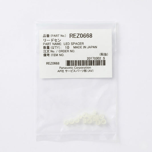 lear plastic bag containing 10 small, translucent off-white LED spacers gathered at the bottom. The top portion of the bag features a white manufacturer label with black text displaying 'PART No. REZ0668', 'PART NAME: LED SPACER', 'QTY: 10', 'MADE IN JAPAN', and 'Panasonic Corporation' alongside a barcode. The item is centered against a clean, solid white background.