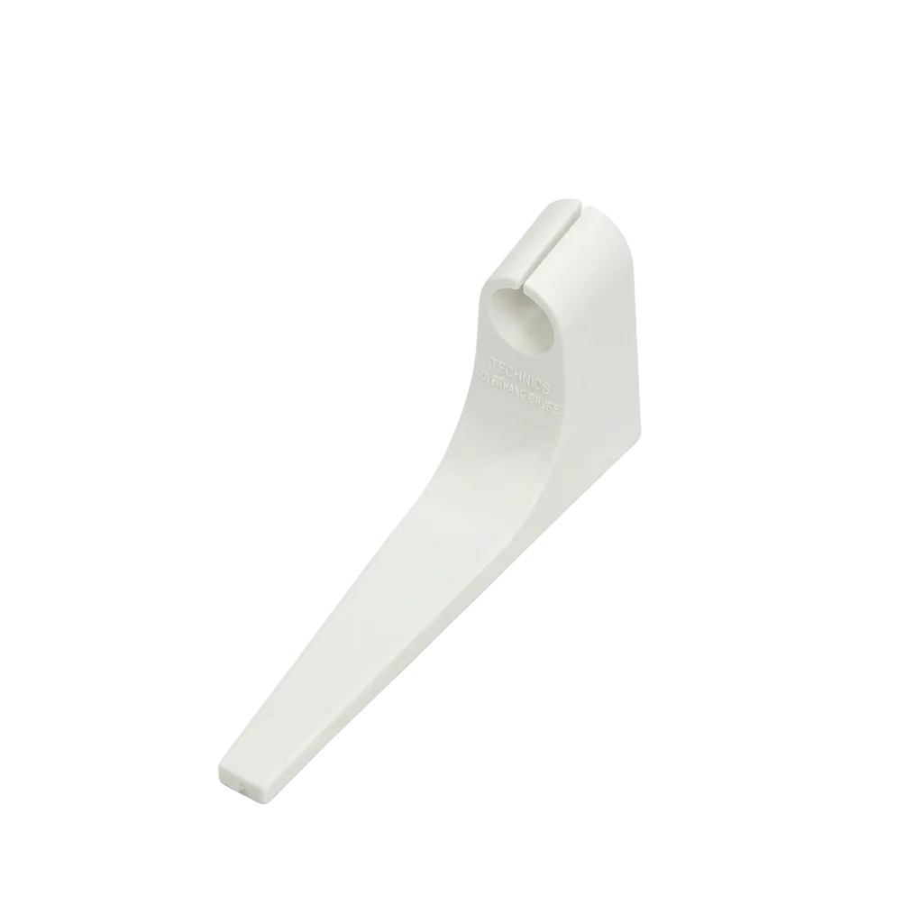 A white plastic Technics overhang gauge tool for turntable cartridge alignment, angled diagonally on a plain white background. The tool features a long, tapered pointer end and a raised, rounded cylindrical collar on the opposite end with a slot down the middle.