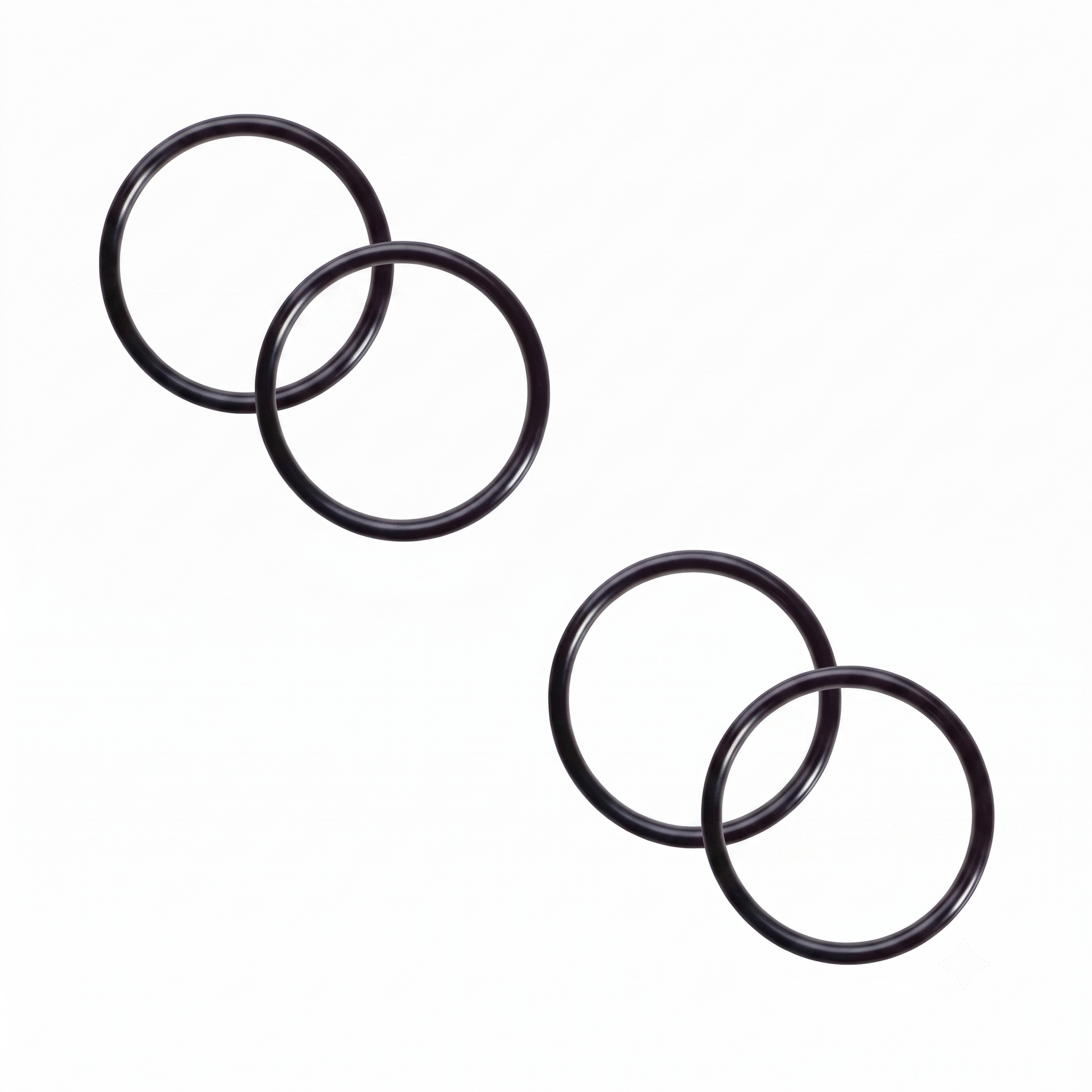Four black rubber O-rings arranged in two pairs on a plain white background.
