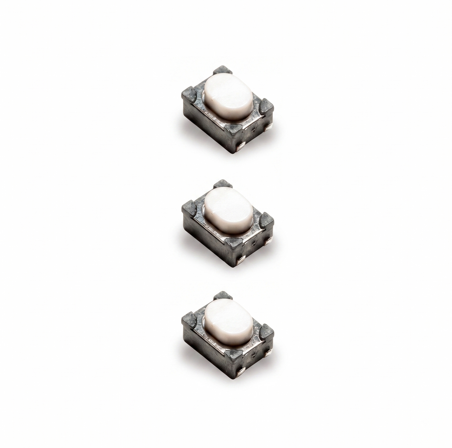 Three small rectangular metal components with oval white tops, arranged vertically on a plain white background.