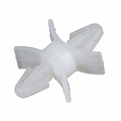 One white plastic four-spoke PCB clip on a white background.