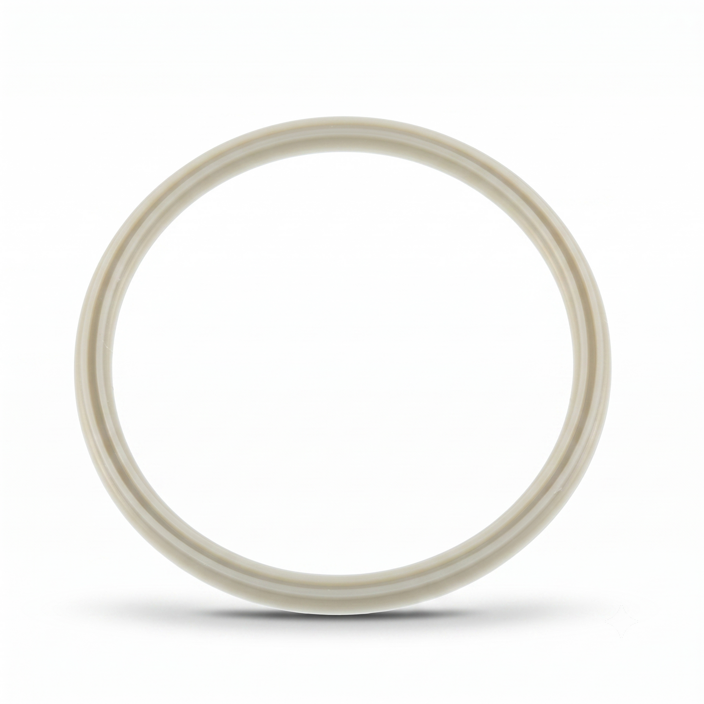 A single circular ring with a thick, smooth, off-white or cream-colored rim, photographed against a solid white background with a soft shadow underneath.