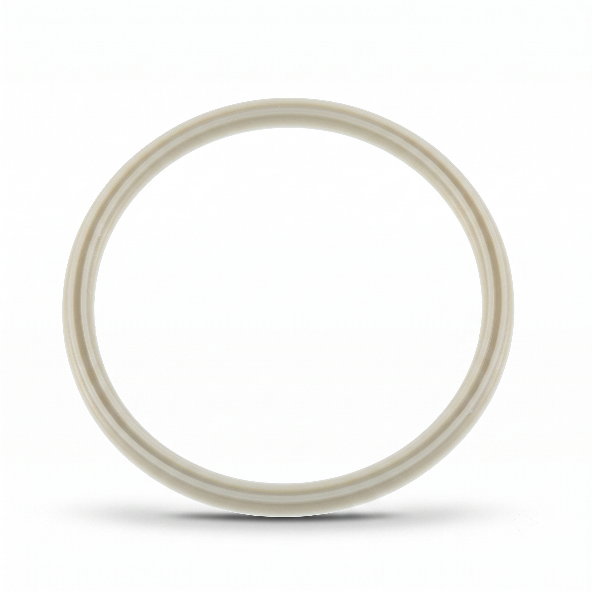 A single circular ring with a thick, smooth, off-white or cream-colored rim, photographed against a solid white background with a soft shadow underneath.