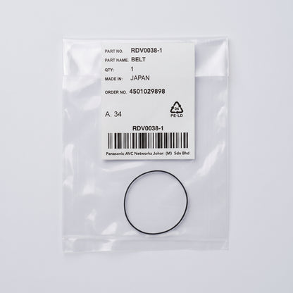A black rubber belt packaged in a clear plastic bag with a white label. The label shows the part number RDV0038-1, part name BELT, made in JAPAN, and a barcode.