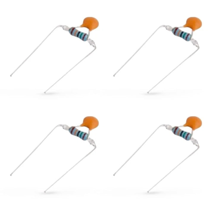 An image featuring four identical electronic components arranged in a two-by-two grid against a plain white background. Each component consists of a blue resistor with coloured bands connected in parallel to a small, orange disc capacitor. The wire leads are bent downwards into a "staple" shape for through-hole mounting on a circuit board.