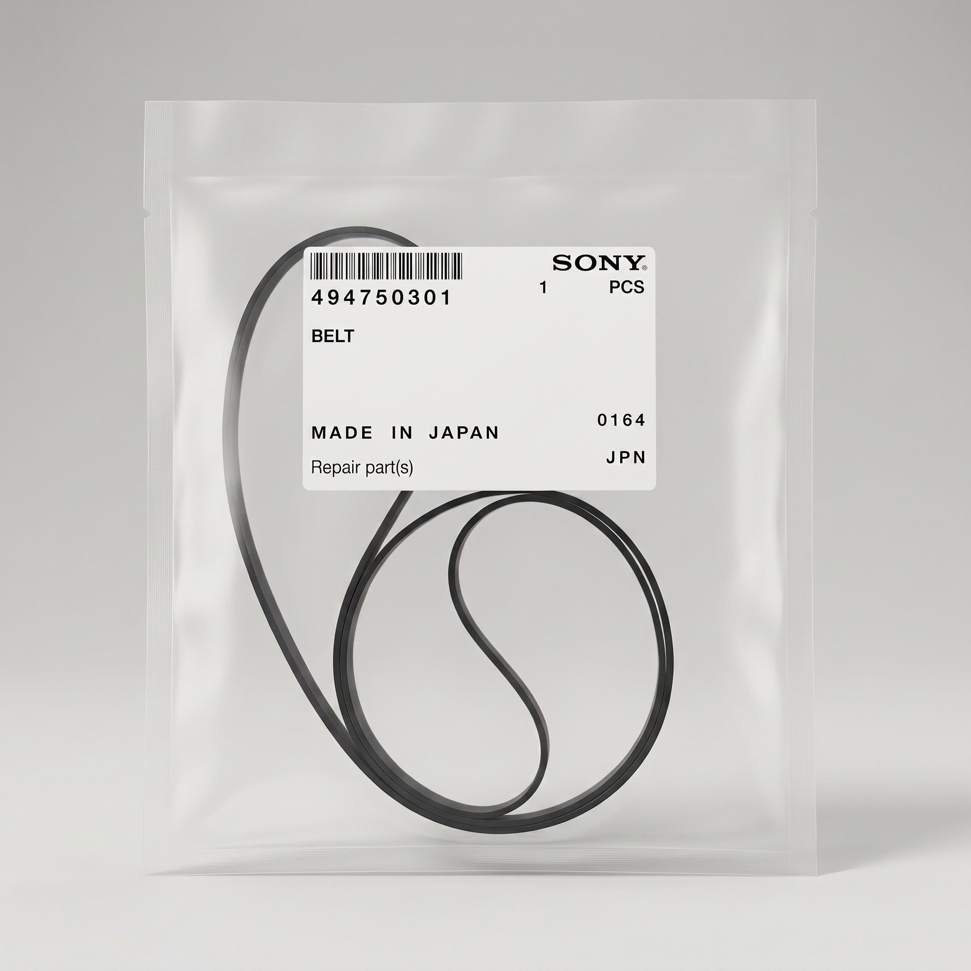 A Sony replacement belt, part number 494750301, shown inside its clear plastic packaging with a white label. The belt is coiled inside the transparent bag against a neutral light gray background.